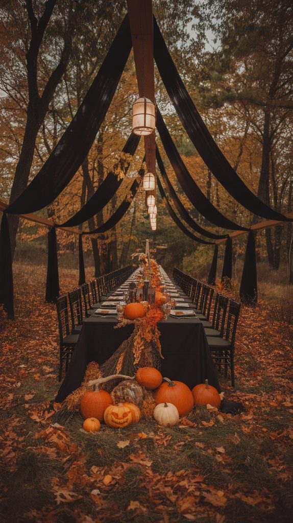a Halloween banquet with a long table under hanging lanterns, black linens